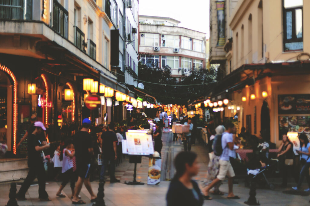 People Walk In Streets Of Istanbul At Night