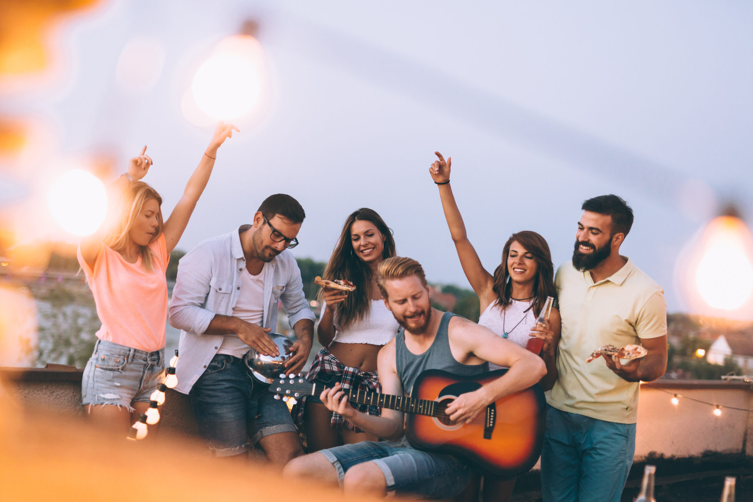 Group Of Happy Friends Having Party