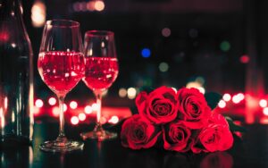 an image banner of roses and two glasses of wine, this article have ideas about valentine date in London, written by PS London Concierge Service